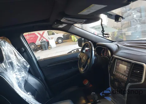 2014 Jeep Grand Cherokee Overland из США, поврежденный, VIN 1C4RJFCT1EC409613